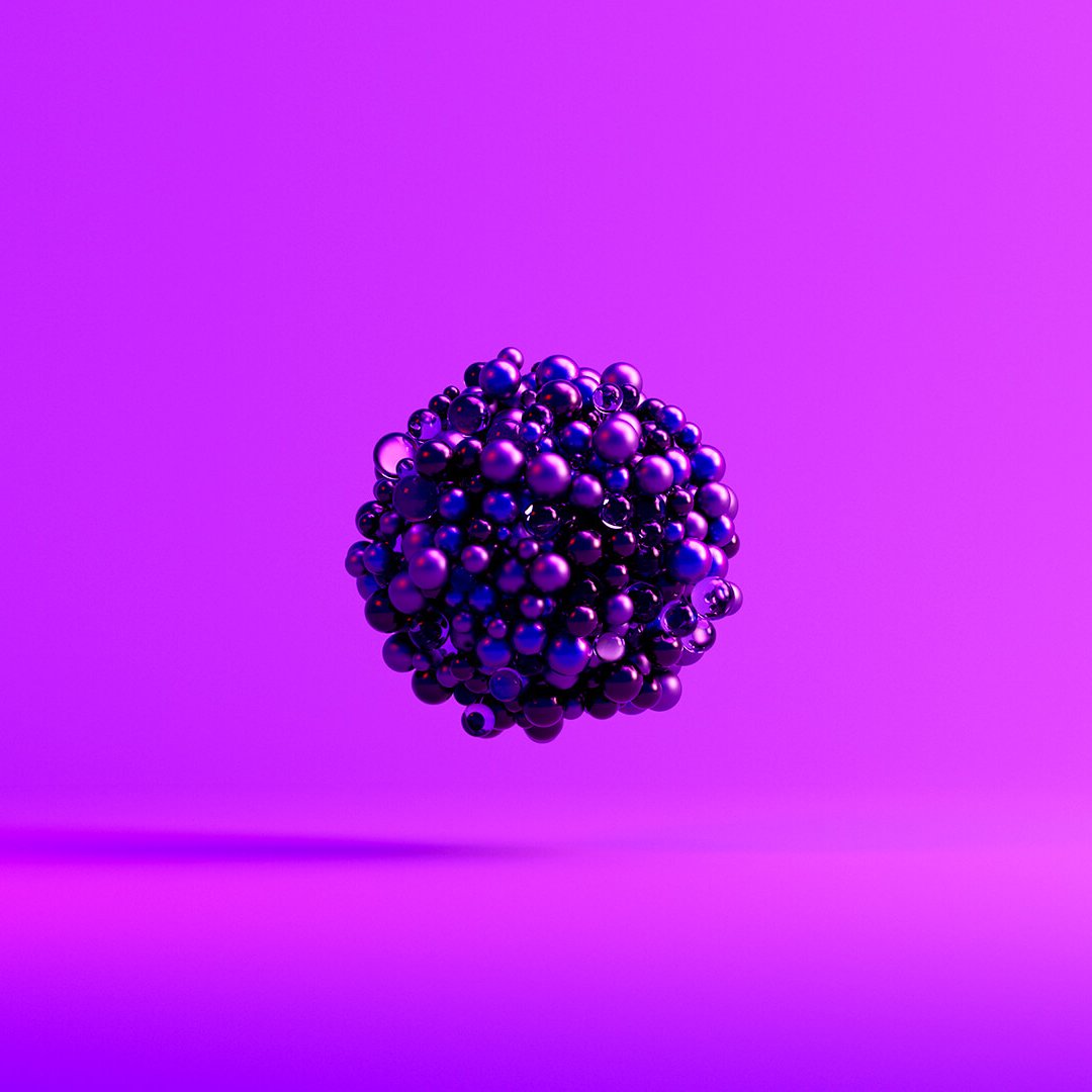 3D render of purple balls in front of purple background